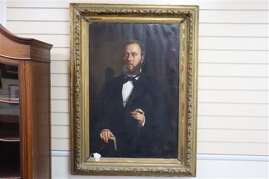 Early 20th century Continental School, oil on canvas, Half length portrait of a gentleman smoking a cigar, 102 x 68cm